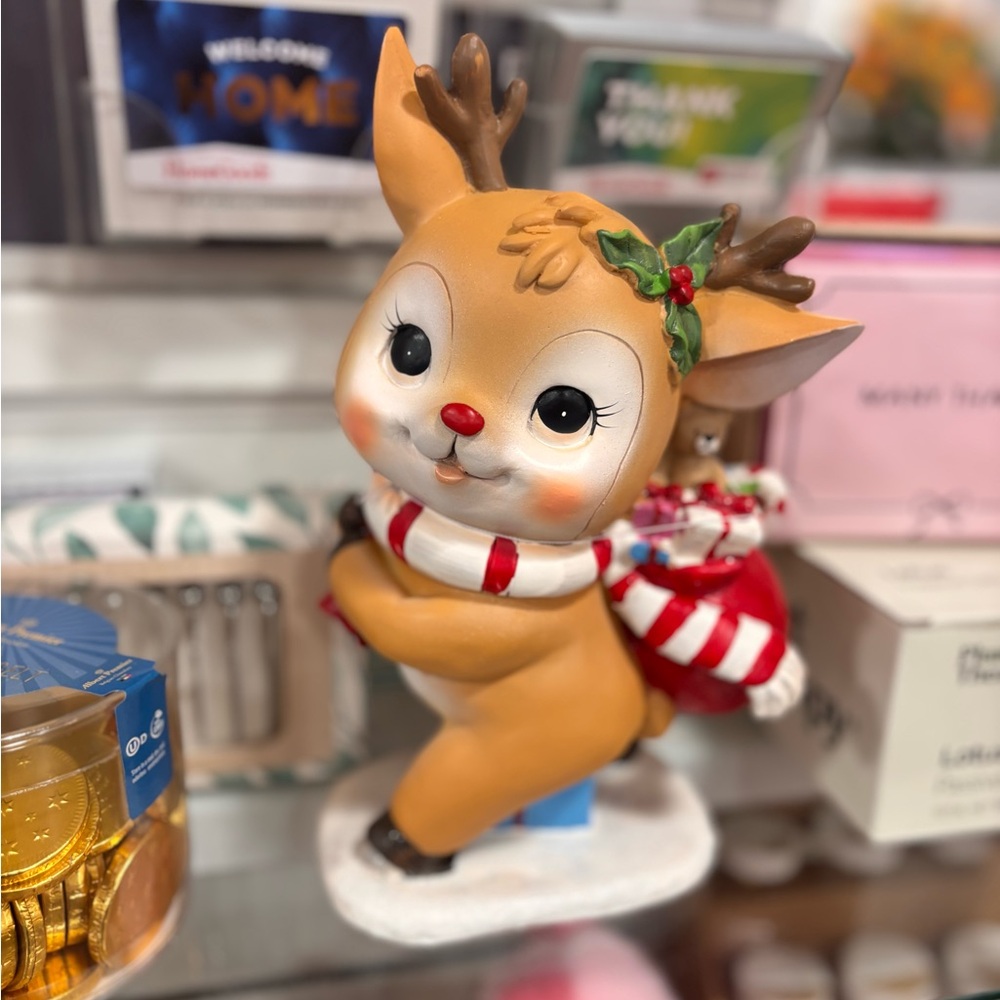 Festive Reindeer Figurine with Red and White Accents